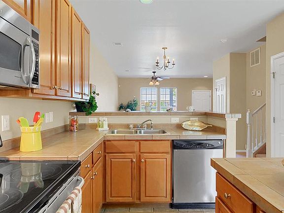 The kitchen has a center island along with a breakfast bar!