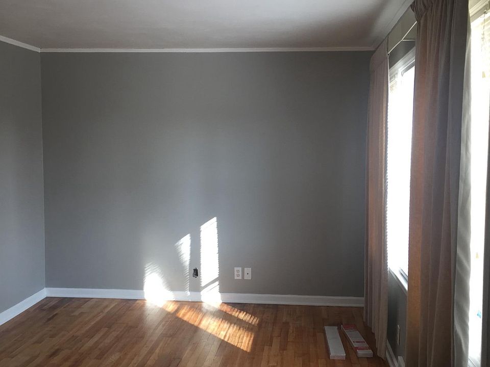 Spacious living room with hardwood floors All walls and ceil