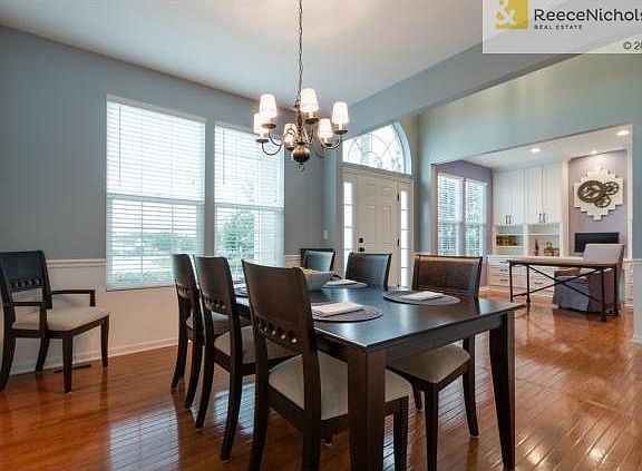 View of dining room, entryway, and office