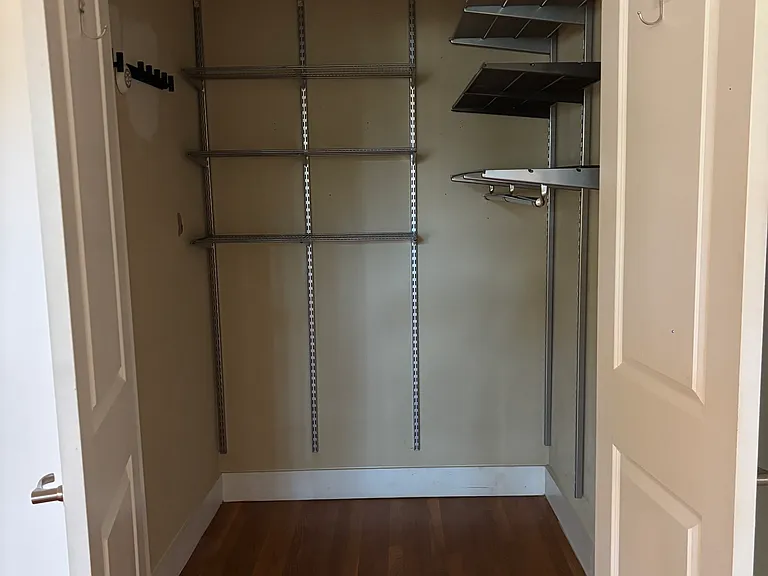 Closet #1: Huge entry closet with customizable Elfa storage system.