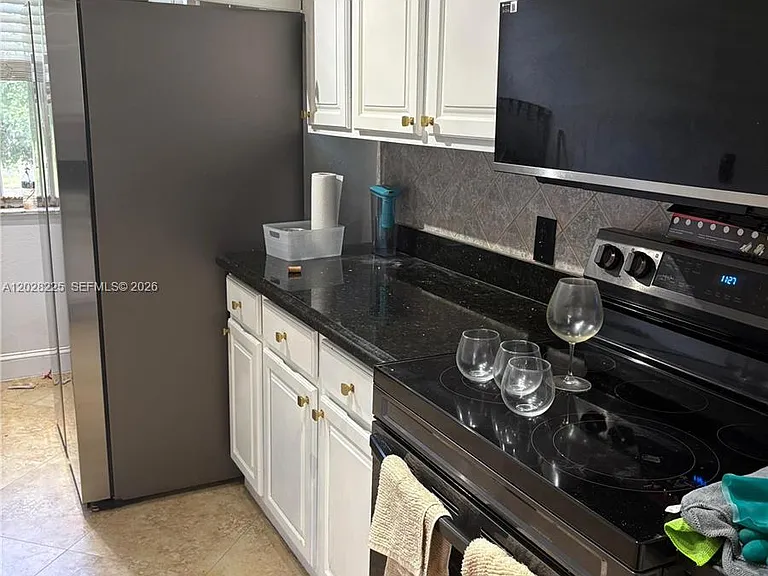 8761 Wiles Rd #301 — Photo 2