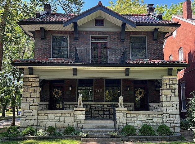 Exterior of home. The door to the second floor is on the right side.