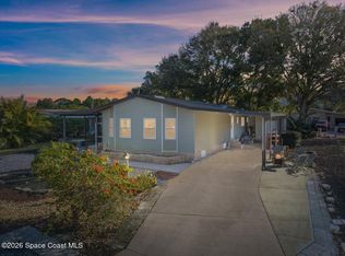 925 Evergreen St, Barefoot Bay, FL 32976