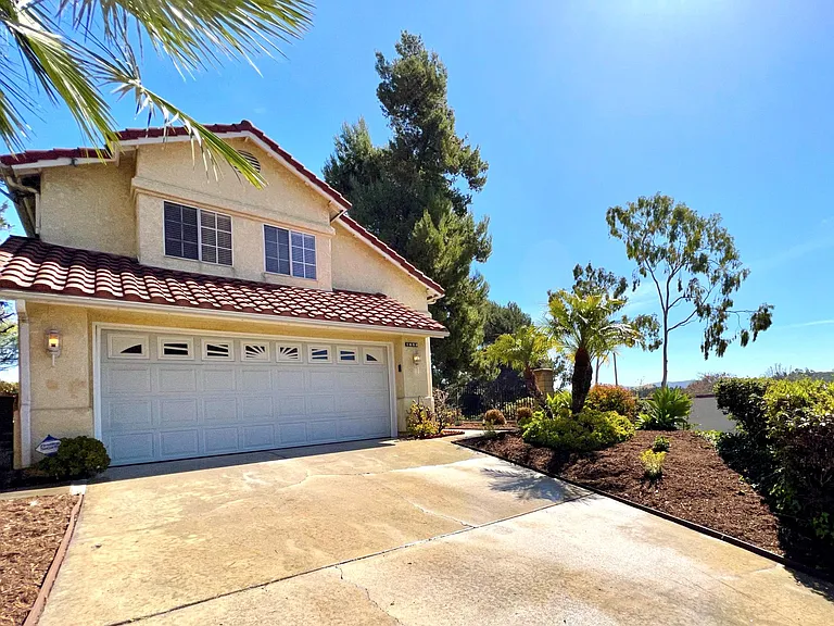 Enjoy a hilltop location with a 2-car attached garage and a usable full-length driveway, offering ample parking for residents and guests.