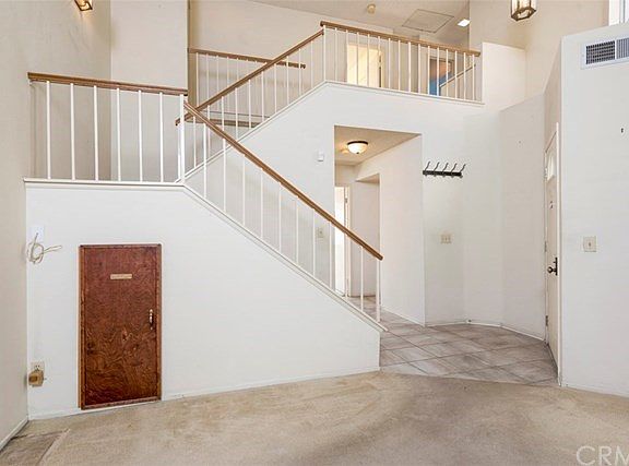 Wine closet under stairs