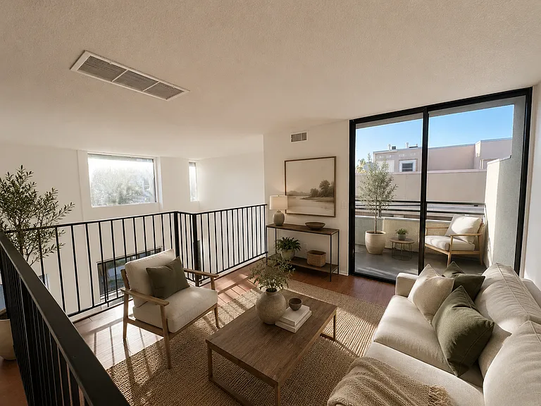 staged photo of loft as additional living room