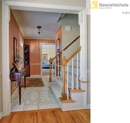 Front entry between dining room and living room