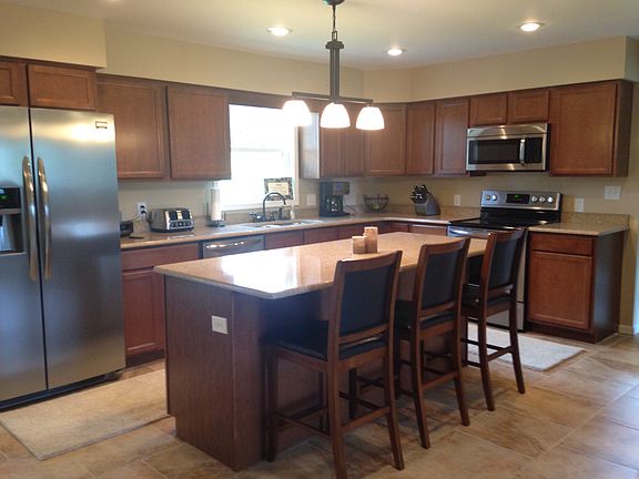 Kitchen with large bar