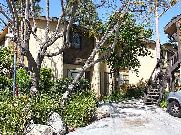Downstairs entry walk way to unit, nestled in this building
