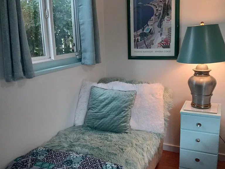 Super comfortable lounge for reading or watching television in 2nd bedroom.