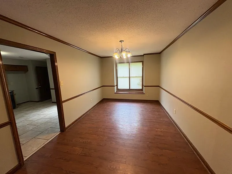Spacious Brick Home with Fireplace, Attached Garage & Fenced Yard — Photo 4