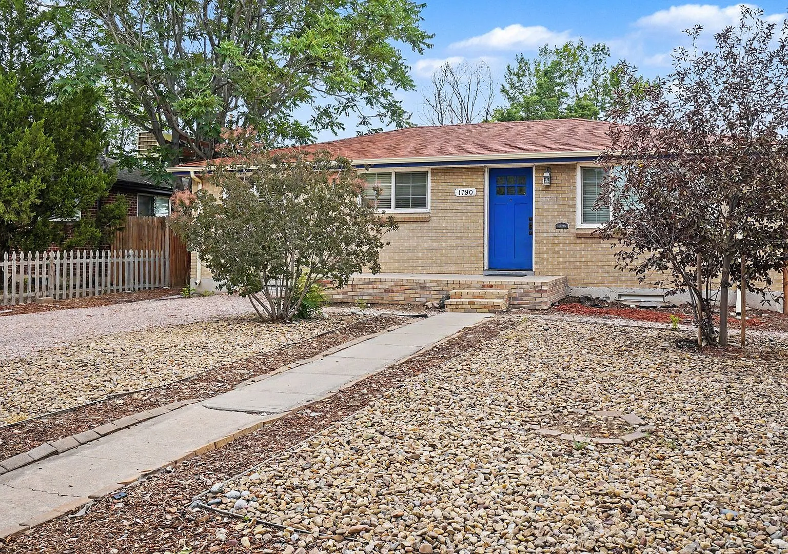 Spacious 5-Bedroom Denver Home with Updated Kitchen and Large Fenced Backyard — Photo 3