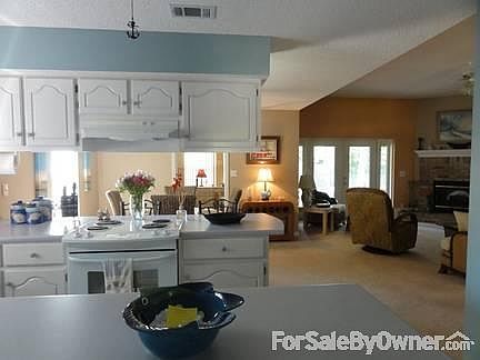 Kitchen
						:
						Looking into dining room
