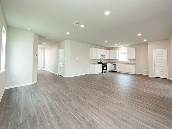 Family Room to Dining Area and Kitchen