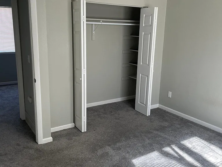 Closet with shelves on both sides