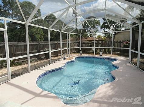 Screened In Ground Pool fenced yard