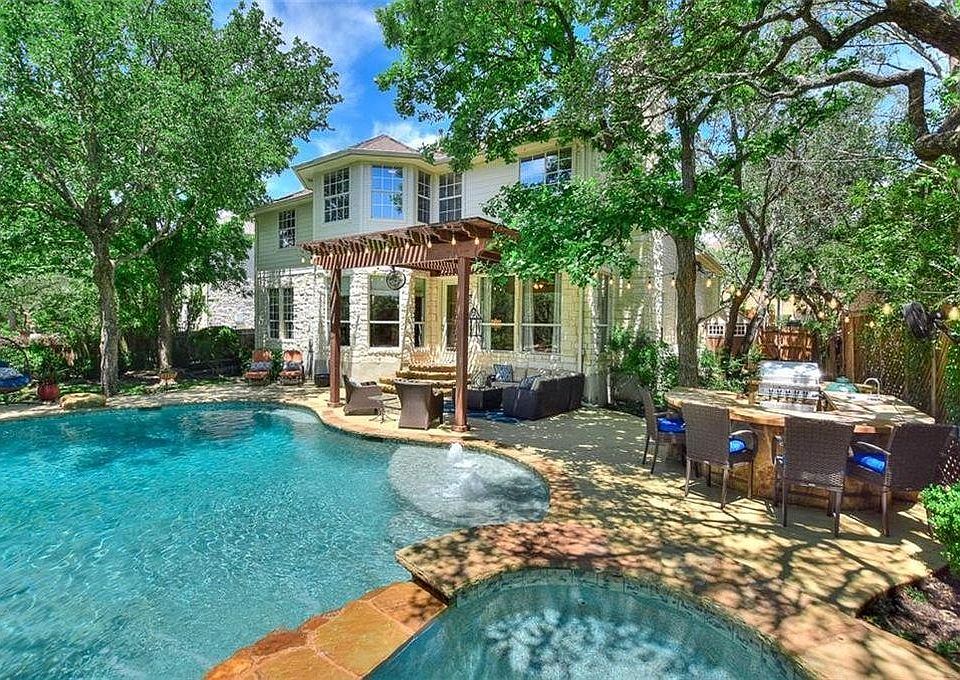 Pool with sauna tub and outdoor grill