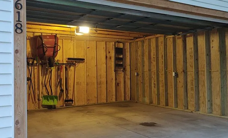 2 car garage (note: access limits to 1-car use + storage. Rental will include tools for yard maintenance and snow removal)