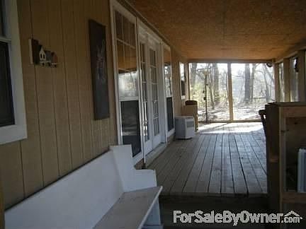 Screened Porch
						:
						Excellent for snoozing/reading/watching the world drift by!