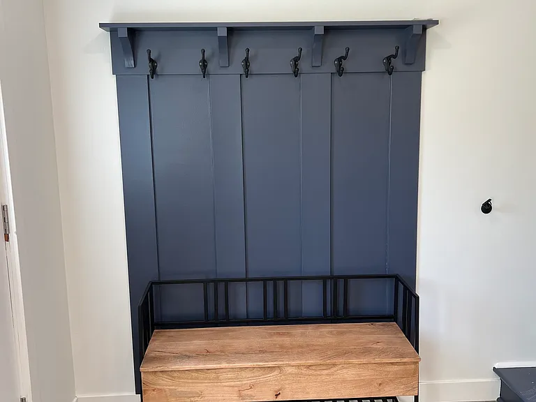 Front door space that provides area to hand coats, towels, etc.