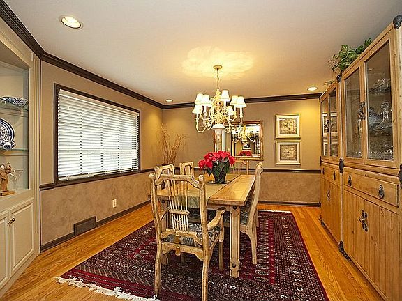 Formal dining room w/ built-in china cabinet