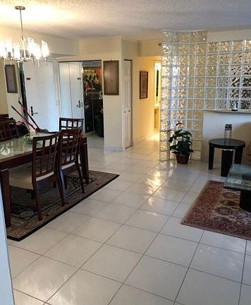 5th image of 3530 Mystic Pointe Dr APT 202