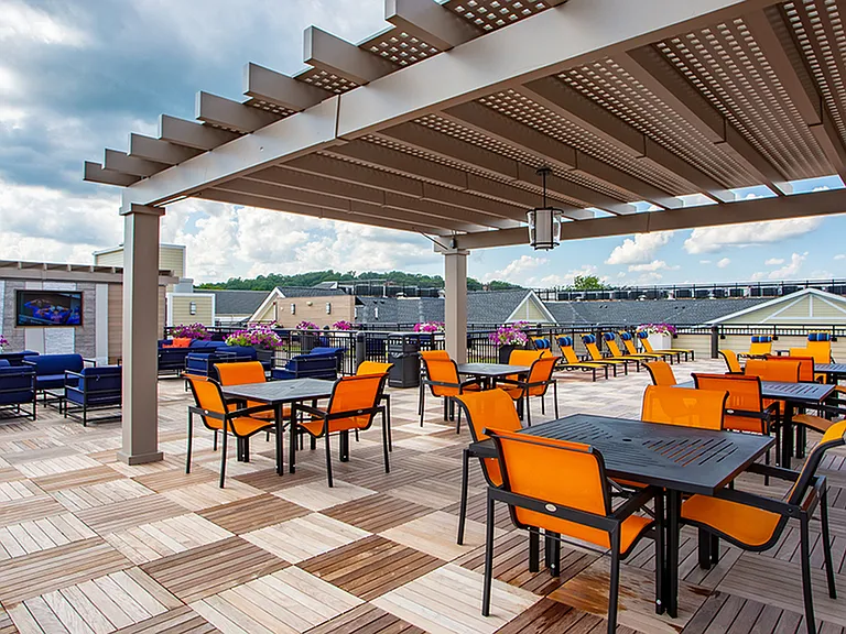 Pergola seating on an expansive rooftop deck