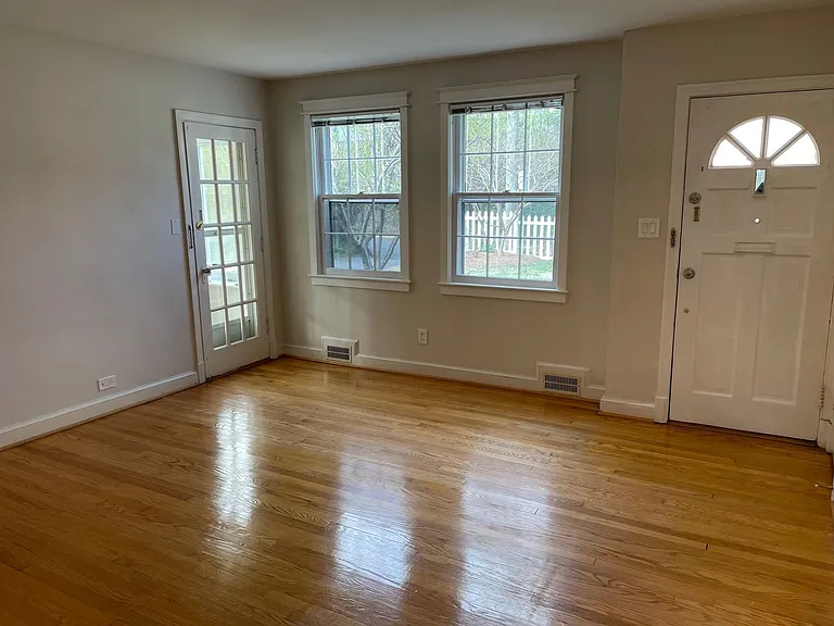 Living room looking toward the front door.