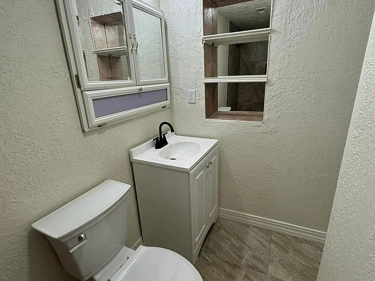 11409 Ralph Ave NE — Photo 4