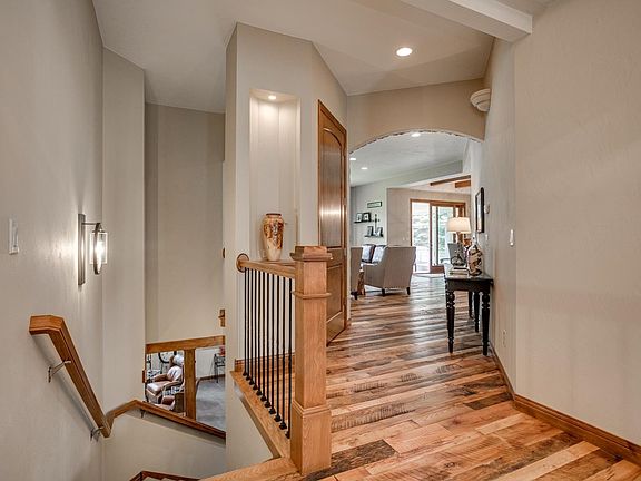Foyer W/Unique Open Stariway To Lower