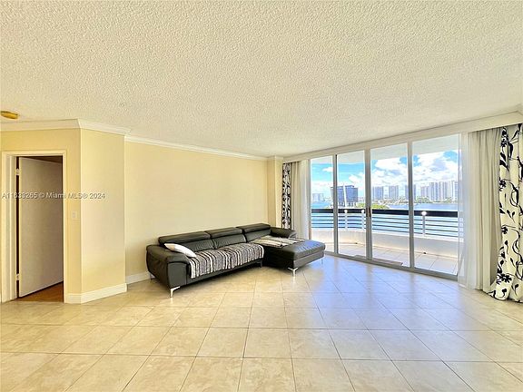 4th image of 3600 Mystic Pointe Dr APT 1206