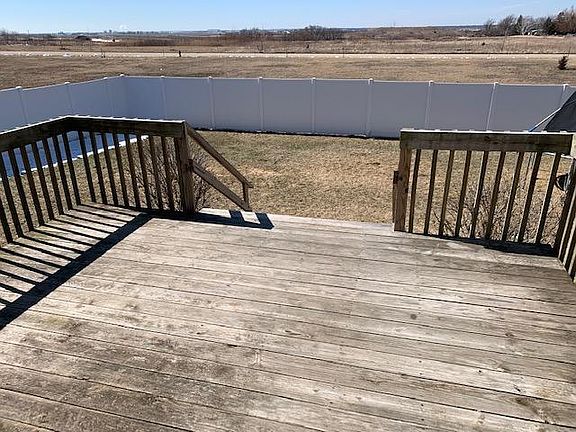 Deck and fenced in back yard