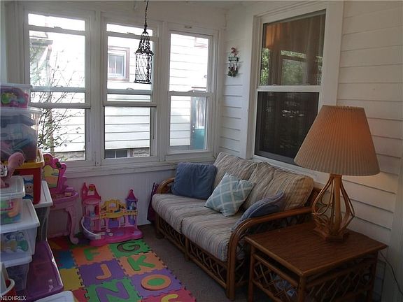 The sitting/toy room greets your visitors to your home.  Come, sit a while, and watch your neighbors walk by!