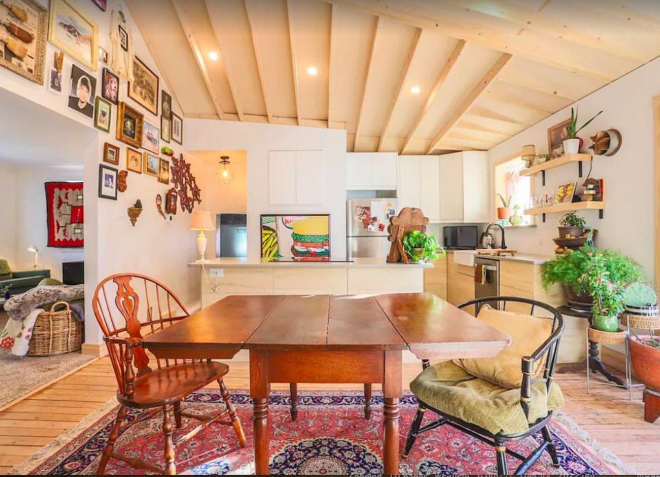 Kitchen and diningroom. 2021 remodel with new appliances (glass top stove/oven) vaulted ceiling with recessed lighting.