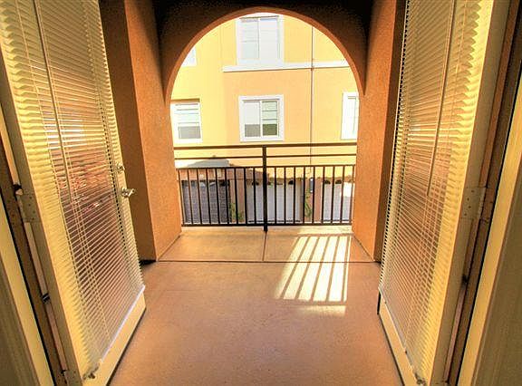 French doors off the master inviting the outdoors in