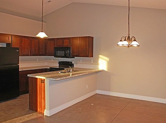 Kitchen with large eating bar