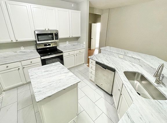 New stone countertops and tile!