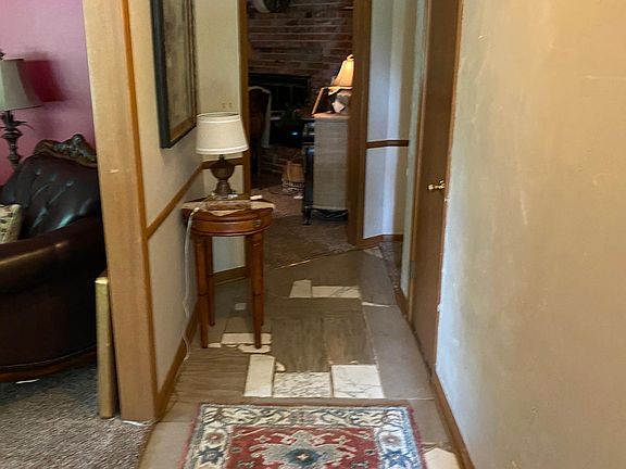 Front Entry - Formal Living room and dining room to the left, Family room straight ahead along with Kitchen.