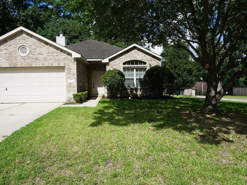 Corner lot with large yard front and back containing mature landscaping