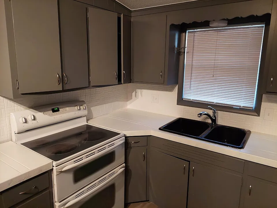 Plenty of cabinet space in kitchen. Freshly painted.