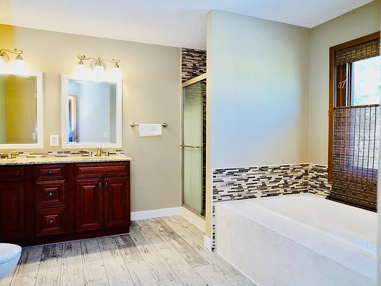 Spacious Master Bathroom, locates to the left side of the walk-in closet.