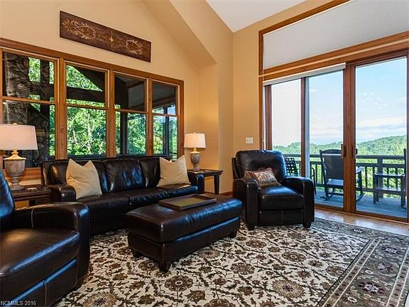 Another view of Living Room looking into screened porch.