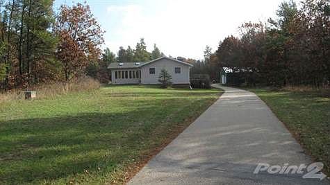 Welcome Home! Located on 6.8 acres.