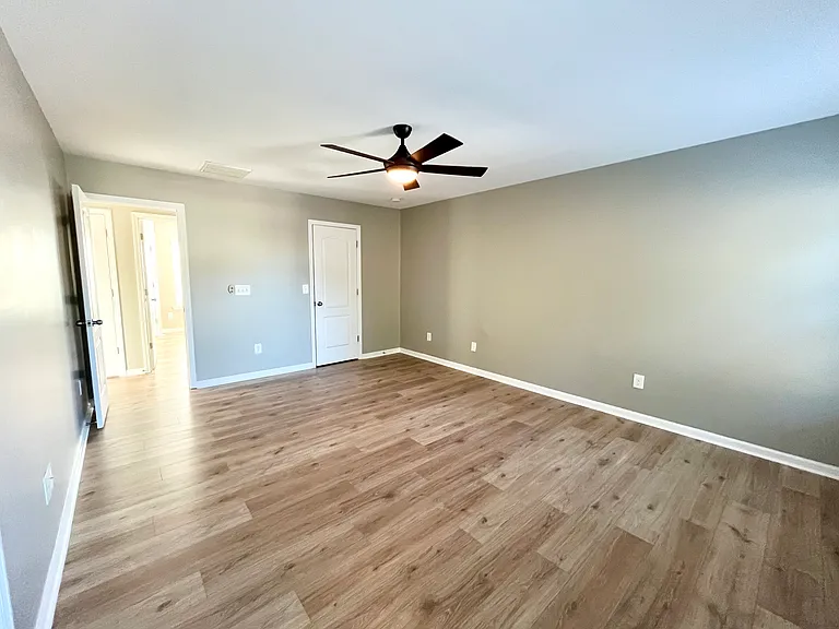 Master bedroom with walk in closet