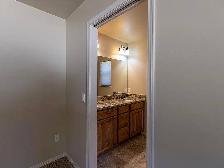 Master bath with double granite vanity