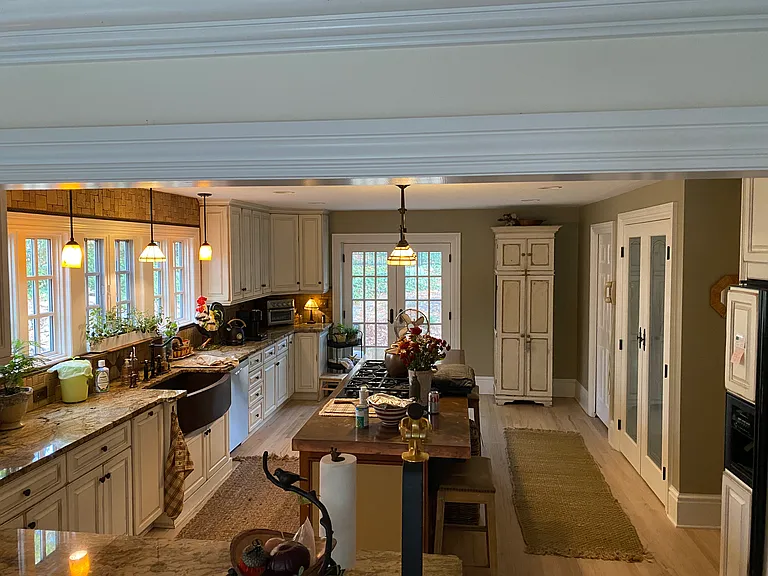 Large kitchen joined with great room with access to yard