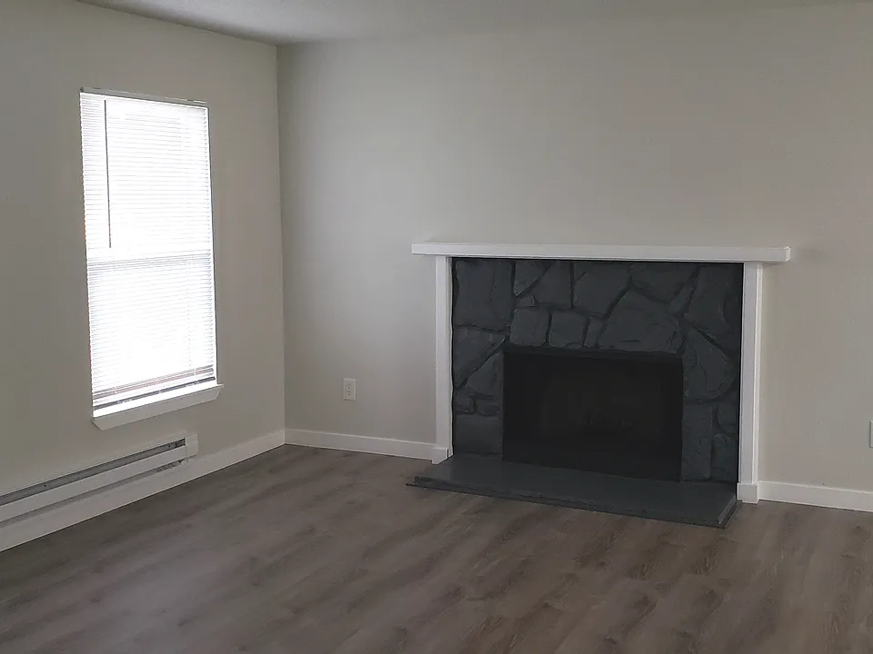 Huge Living Room with Wood Burning Fireplace