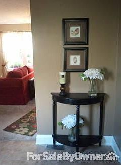 Part of Entry
						:
						1/2 bath not pictured to right of entryway. Storage under steps in coat closet.
