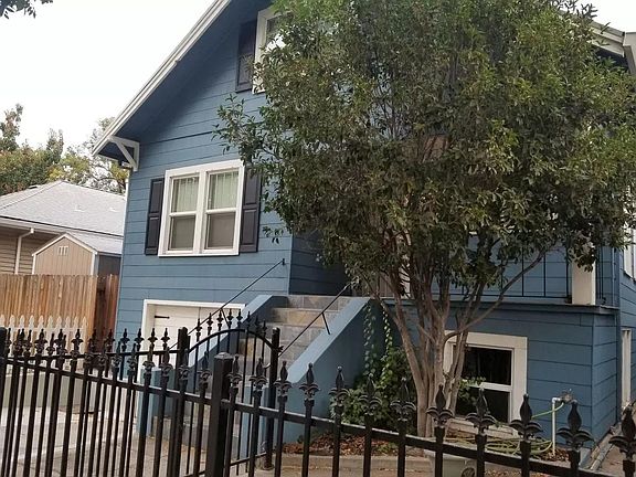 Private front yard and upper level porch area large enough for bistro seating, planters, etc