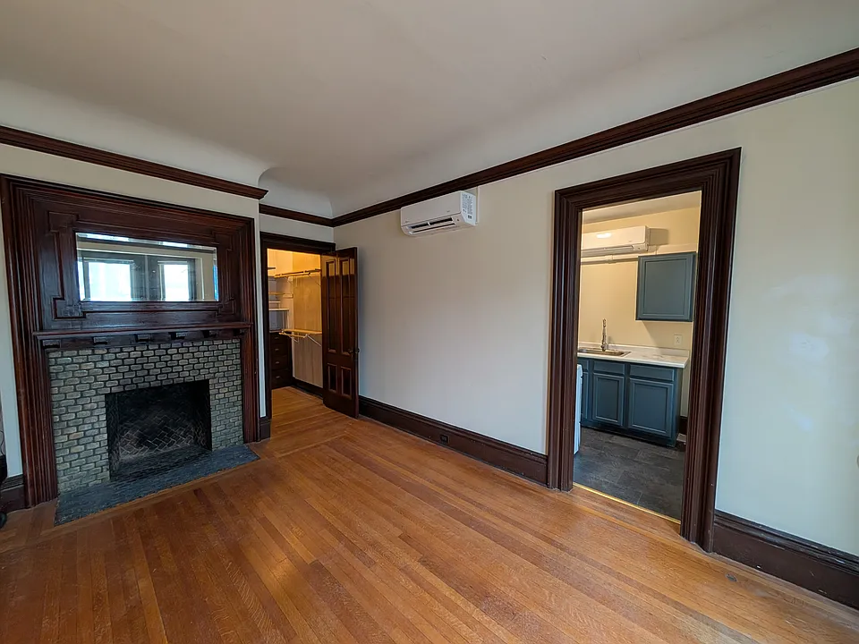 Main Room w/ Decorative Fireplace